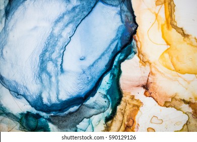 Abstract arts background. Natural watercolor wallpaper. Style incorporates the swirls of marble or the ripples of agate. Blue, yellow, brown and indigo painting with brush stroke texture. - Shutterstock ID 590129126