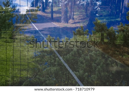 View through the reflective pane over a terrace onto the coast of Western Canada