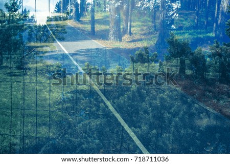 Similar – View through the reflective pane over a terrace onto the coast of Western Canada