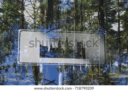 Similar – View through the reflective pane over a terrace onto the coast of Western Canada