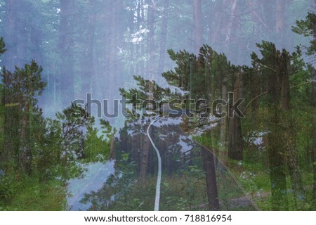 Similar – View through the reflective pane over a terrace onto the coast of Western Canada