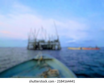 Abstract Background In An Anchovy Fishing Spot By Coastal Fishermen. The Lens Is Out Of Focus