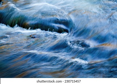 Abstract Background Autumns Water Flows In The River