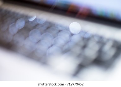 Abstract background backlit bokeh from labtop keyboard