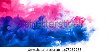 Abstract background banner with colorful pink, purple, and blue shades of acrylic ink in water. Festival of colors. Color Explosion panorama isolated on white. Copy space