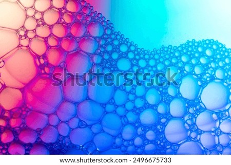Abstract background bio technology, macro photography foam and water with gradient background. Molecule multicolor backgorund