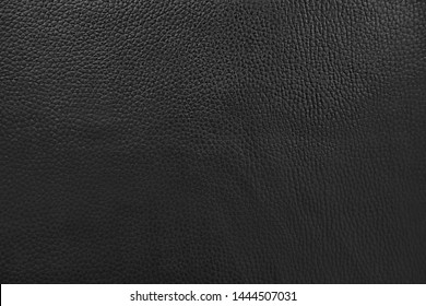 abstract background of black leather for furniture upholstery close up