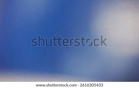 abstract background with a blue white gradient with subtle noise and grain texture