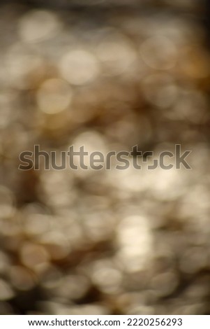 abstract background - blured lights on darkbrown background