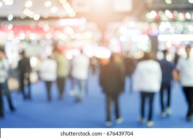 Abstract background blurred many people in the exhibition event. - Shutterstock ID 676439704