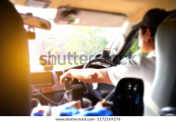 Abstract\
background blurred In the van and\
driver