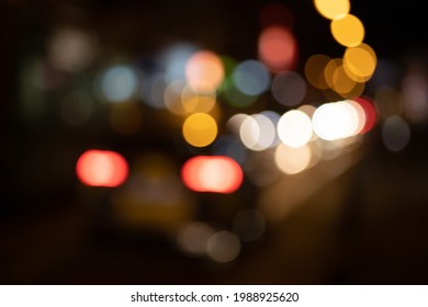 Abstract Background With Blurry City Lights On The Street