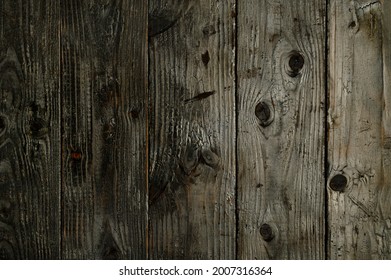 Abstract background of burnt wooden boards. Closeup topview for artworks. High quality photo