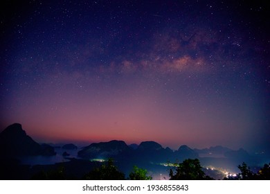 Abstract background of celestial stars, blurred wallpaper of the Milky Way at night, is a natural beauty. Seen during the time of the season - Shutterstock ID 1936855843