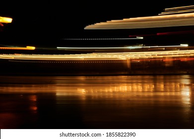 Abstract Background Of City Lights Made With Long Shutter Speed. Lights Photo Art.