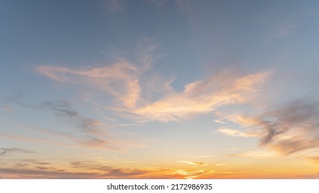 abstract background of cloudy sunset sky golden hour - Shutterstock ID 2172986935