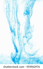 Abstract background color ink drop in water, motion swirling. Blue cloud of paint on white.