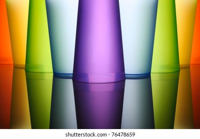 Abstract background of colored glasses of frosted plastic