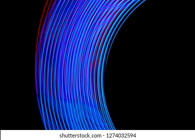 Abstract background of colored red, purple and blue stripes. The concept of geometric aesthetics.