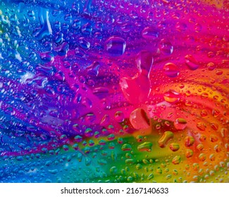 Abstract background. Creative modern mixing colors concept with water drops.