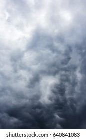 Abstract background, dark sky with clouds close-up