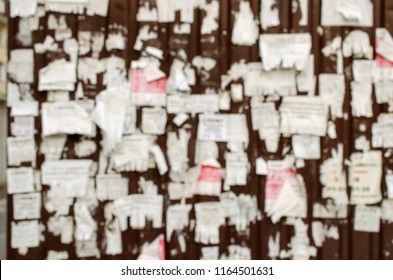 Abstract background. Defocused image of a wall or billboard outdoors. Artistic blur. Close-up.