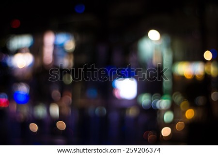 Abstract Background of Defocused Lights of Cars And Billboards of Stores of The Kaohsiung City at Late Night.