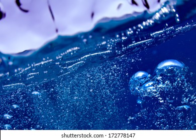 Abstract background design template. Blue underwater surface and air bubbles 
