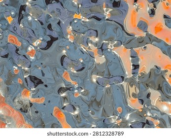 An abstract background of a distorted reflective metallic surface with warped ripples showing orange and blue reflections.