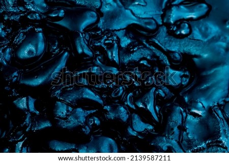 abstract background of drops of solidified metal