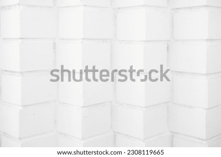 Abstract background. Empty white brick surface. Original brick laying at angle forward. Back for design