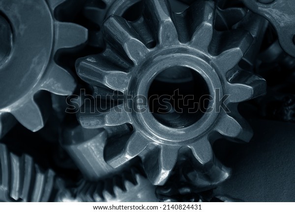 Abstract background of engine\
gears. The concept of production and teamwork.Selective\
focus.