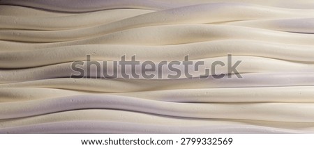 Abstract background featuring elegant wavy lines in cream and light purple. Soft shadows highlight the 3D relief texture. Ideal for modern designs, luxury branding, or serene backdrops.