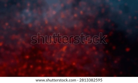 An abstract background featuring a gradient of deep red to dark blue, filled with small glowing particles and a smoky texture.