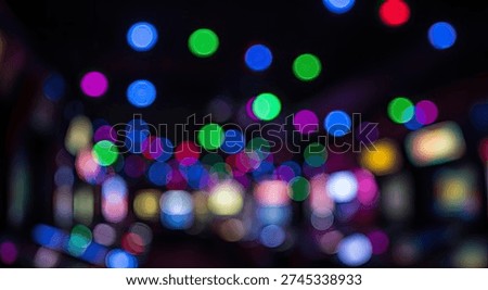 An abstract background featuring a multitude of vibrant, colorful bokeh lights.