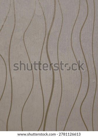 Abstract background featuring vertical, flowing wavy lines in a gold or light brown tone against a textured cream-colored surface. 
