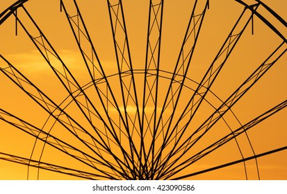 Abstract Background,  ferris metal-wheel against sky with sunset. - Powered by Shutterstock