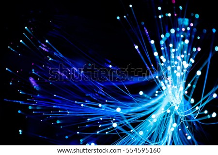 Abstract background  fiber optics close up, computer communication technology. Optical lighting.