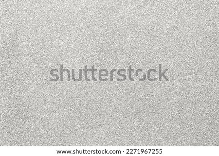 Abstract background filled with shiny silver glitter