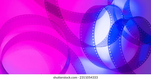 abstract background with film strip.colorful abstract cinema background with film strip - Shutterstock ID 2311054333