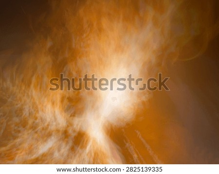 Abstract background of glowing blurred fire flames, creating a dynamic, warm, and intense heat effect.