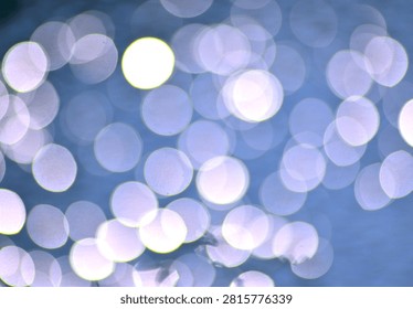 Abstract background image featuring subdued bokeh circles.