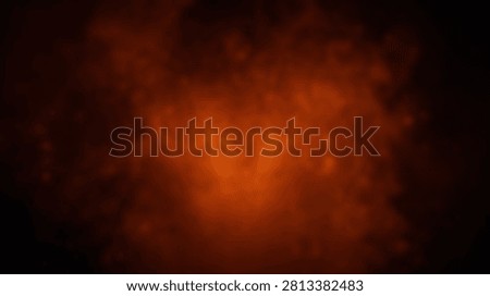 An abstract background image featuring a vibrant explosion of fiery orange and red colors, creating a sense of intense energy and warmth.