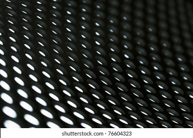 Abstract Background Image: Perforated Bent Metal Sheet Grid In Black And White.