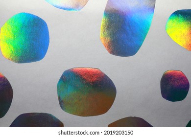 
Abstract Background Of Iridescent, 
Pearlescent Spots. Rainbow Circles On White Background.