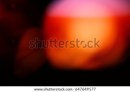 Abstract background - light color flashes and rays on black. Lens flare. For use as texture layer in your project. Add as 
