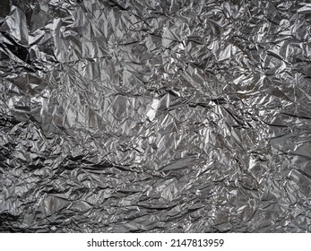 Abstract Background Made Of Black Shiny Plastic.