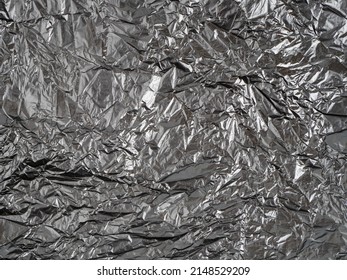 Abstract Background Made Of Black Shiny Plastic.