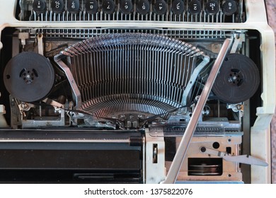 Abstract background with metal part and elements of retro-writing machine. keyboard with black keys - Powered by Shutterstock