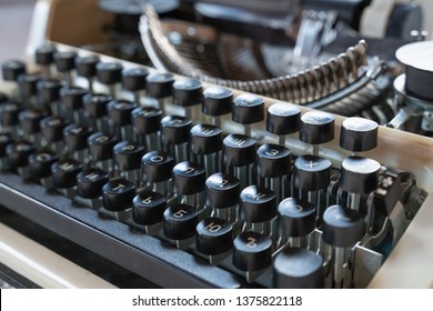 Abstract background with metal part and elements of retro-writing machine. keyboard with black keys - Powered by Shutterstock